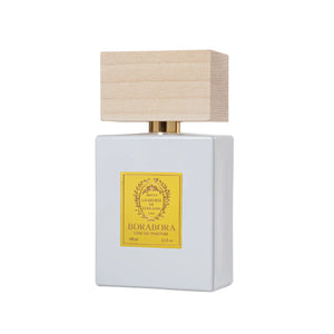 Bouteille du parfum Bora Bora Giardini di Toscana avec étiquette jaune et capot en bois