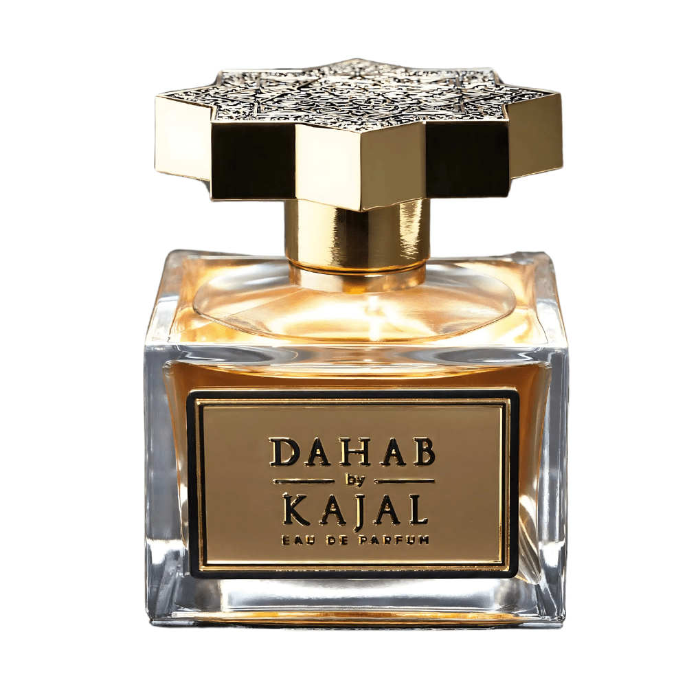Flacon de parfum Kajal Dahab en gros plan, verre transparent et bouchon étoilé doré